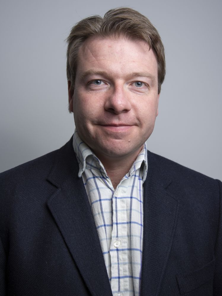 Head and shoulders photo of a man - Anthony Hopkins - looking at the camera